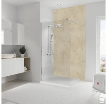 Salle de bains lumineuse avec cabine de douche, lavabo et tapis de bain