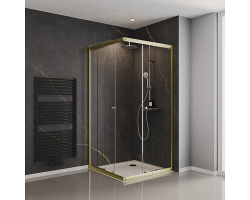 Eckdusche mit Goldrahmen und Heizkörper in einem Badezimmer