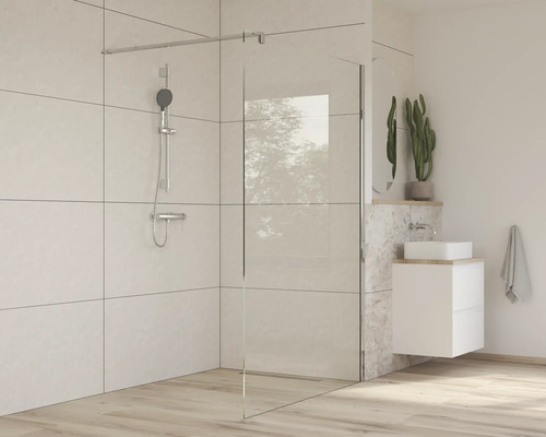 Badezimmer mit Duschkabine, Waschbecken und Armatur