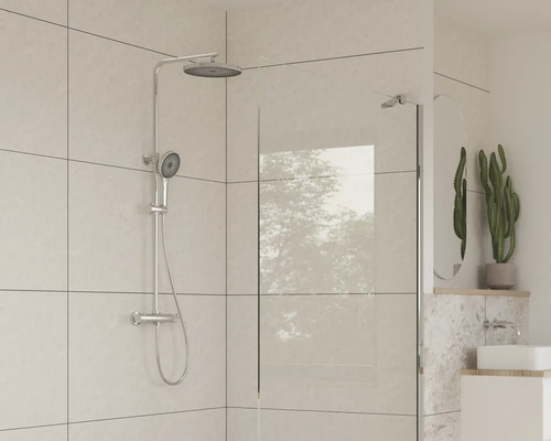 Ensemble de douche avec paroi de douche et lavabo dans la salle de bain