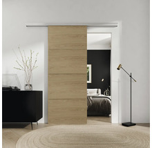 Porte coulissante en bois dans une chambre moderne