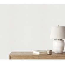 Gros plan d'un papier peint texturé blanc sur un mur