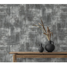 Papier peint décoratif avec motif abstrait en gris et blanc.