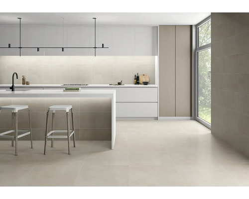 Cuisine moderne avec carrelage au sol, îlot de cuisine et design minimaliste