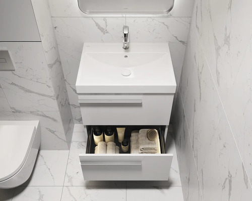Salle de bains moderne avec meuble sous-lavabo, tiroir ouvert et robinetterie