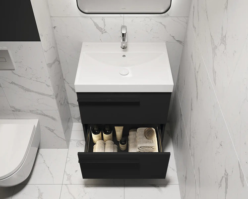 Salle de bain moderne avec meuble sous-vasque, tiroir ouvert et carrelage en marbre