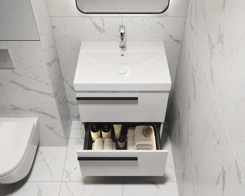 Salle de bains moderne avec meuble sous-vasque, tiroir ouvert et robinetterie