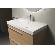 Meuble sous-vasque avec lavabo et robinet dans la salle de bain