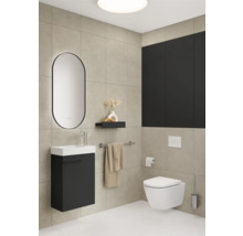 Salle de bain moderne avec lavabo, miroir, toilettes et porte-serviettes