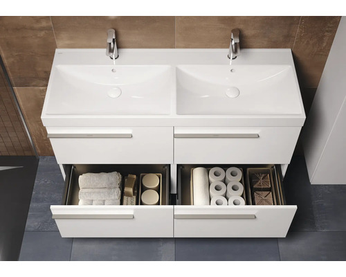 Meuble sous-vasque avec deux lavabos et tiroirs pour le rangement de la salle de bain.