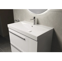 Meuble-lavabo blanc avec tiroirs et lavabo à poser