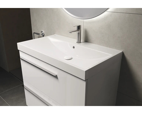 Meuble-lavabo blanc avec tiroirs et lavabo à poser