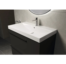 Meuble sous-lavabo avec lavabo et robinet dans la salle de bain