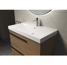 Meuble sous-lavabo avec lavabo et robinet dans la salle de bain