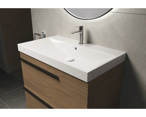 Meuble sous-lavabo avec lavabo et robinet dans la salle de bain
