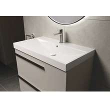 Meuble sous-vasque avec lavabo et robinet dans la salle de bain