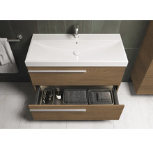 Meuble sous-vasque avec tiroir ouvert pour accessoires de salle de bain