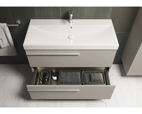 Meuble sous-lavabo avec tiroir ouvert pour salle de bain