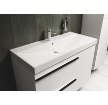 Meuble-lavabo blanc avec deux tiroirs, robinet et distributeur de savon