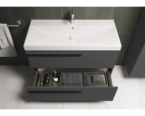 Meuble sous-lavabo avec tiroir ouvert et lavabo