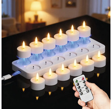 Bougies chauffe-plat LED avec station de charge et télécommande sur table