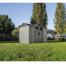 Gartenschuppen aus Kunststoff auf einer Wiese