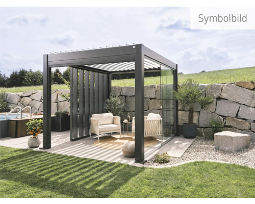 Modernes Gartenambiente mit Pergola, Loungemöbeln und Steinelementen