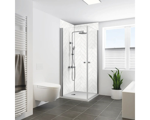 Salle de bains moderne avec cabine de douche, toilettes, radiateur et fenêtre