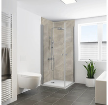 Salle de bains avec cabine de douche, toilettes et sèche-serviettes