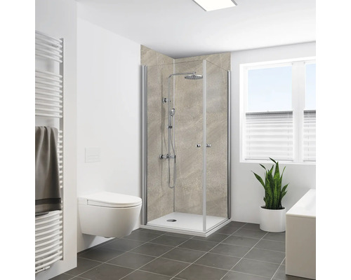 Salle de bains avec cabine de douche, toilettes et sèche-serviettes