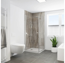 Salle de bain avec cabine de douche, toilettes et radiateur