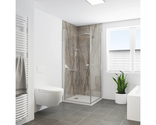 Salle de bain avec cabine de douche, toilettes et radiateur