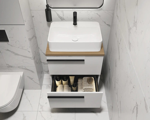 Modernes Badezimmer mit Waschbecken, Unterschrank und geöffneter Schublade