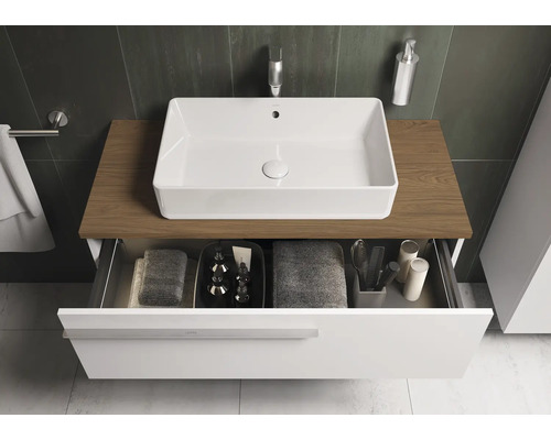 Salle de bains moderne avec lavabo à poser, meuble sous-lavabo avec tiroir et accessoires de salle de bains