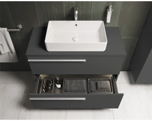 Badezimmer mit modernem Waschtischunterschrank, Aufsatzwaschbecken und offener Schublade