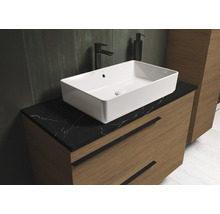 Salle de bains moderne avec lavabo à poser sur un meuble sous-lavabo avec tiroirs et plan de travail noir