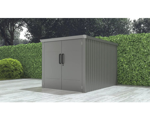 Abri de jardin métallique avec double porte dans le jardin