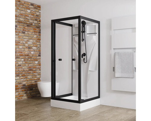 Komplettdusche SCHULTE Juist 80 x 80 x 190 cm schwarz/weiß Schwarze Duschkabine mit Brausegarnitur in einem Badezimmer mit Handtuchwärmer und WC.