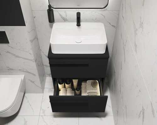 Salle de bains avec meuble sous-lavabo noir, vasque à poser et tiroir ouvert