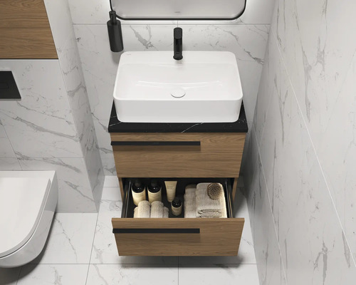 Salle de bains moderne avec meuble sous-lavabo, tiroir ouvert et toilettes.