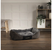 Panier pour chien en tissu avec logo Scruffs dans une pièce décorée