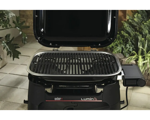 Barbecue électrique Weber Lumin avec couvercle ouvert