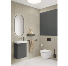 Salle de bains moderne avec lavabo, miroir, toilettes suspendues et accents gris
