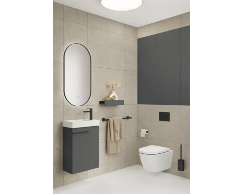 Salle de bains moderne avec lavabo, miroir, toilettes suspendues et accents gris