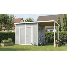 Abri de jardin avec annexe et outils de jardin dans le jardin