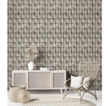 Intérieur avec papier peint à effet pierre tridimensionnel, commode, fauteuil en rotin et décoration