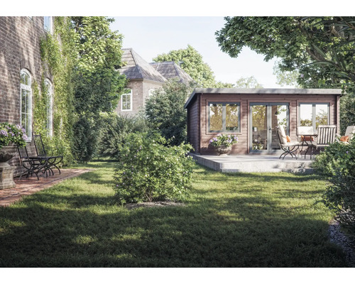 Vue de jardin avec abri de jardin et salon de jardin sur une pelouse