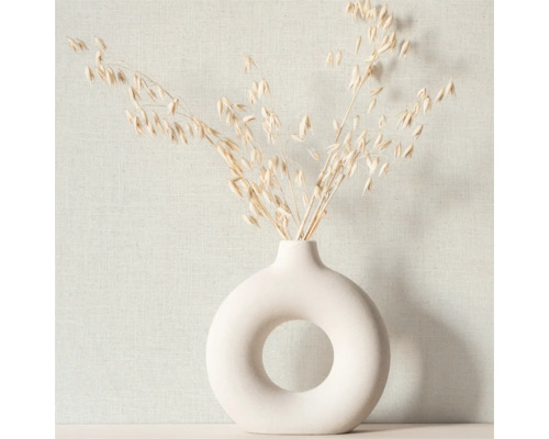 Vase décoratif avec tiges de plantes