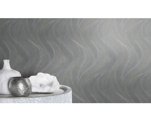 Gros plan d'un papier peint gris avec un motif ondulé