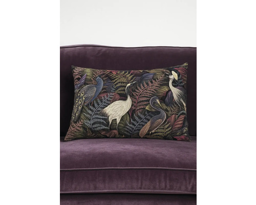Dekokissen mit Vogelmuster auf Sofa